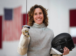 Lynn Botelho unmasked in fencing gear