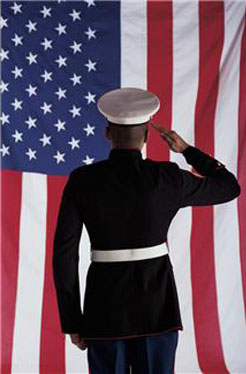 Service member saluting flag